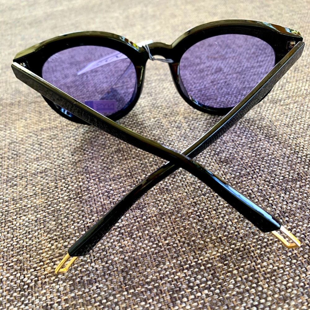 Black with purple shade sunglasses